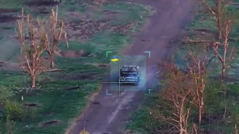 A Ukrainian Tank Fires on a Russian One from Near Point Blank Range