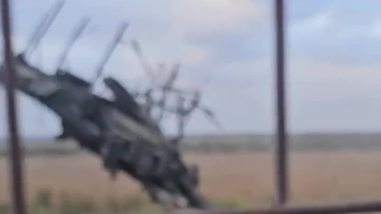 A destroyed Russian T-90M tank with the barrel on its blown of turret stuck in the ground