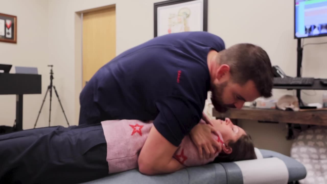 Chiropractor Adjusts Patient With Balloon