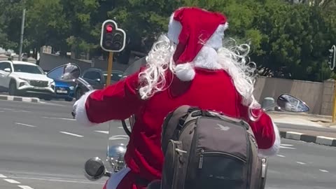 Santa Rides a Motorcycle Through Cape Town