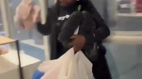 African American Woman Steal Crocs