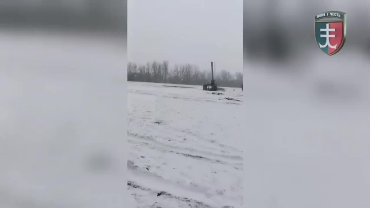 Ukrainian troops judge the firing of a M-240mm Artillery piece