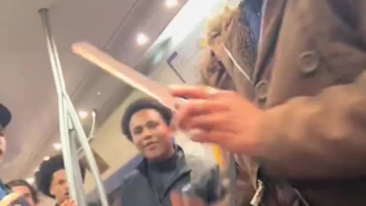 Muslim Woman Dancing With Knife On A Train