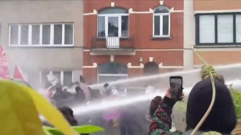 Belgium's turn to tire of Palestinian thugs. In Brussels they get a soaking from water cannons.