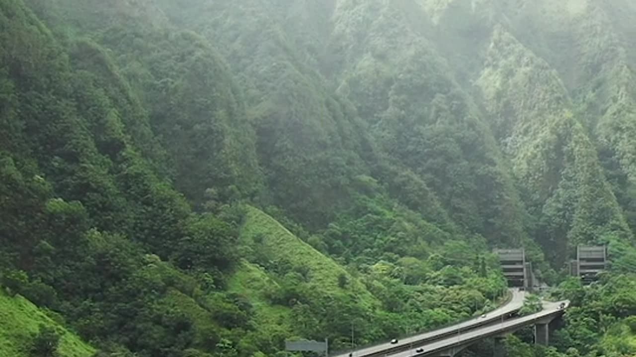 An Elevated Highway In The Mountain Valley In Hawaii