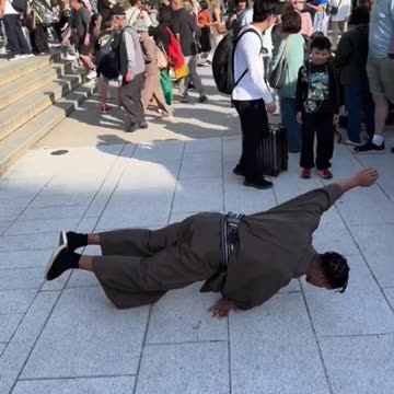 He blocks road in Japan for his circus performances. This is not normal.