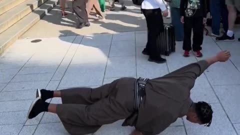 He blocks road in Japan for his circus performances. This is not normal.