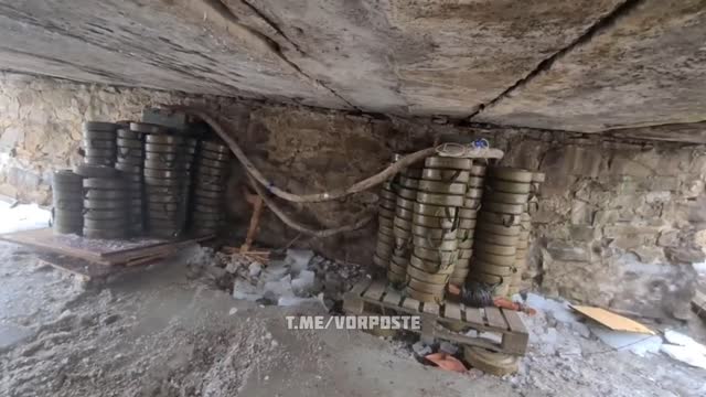 A Ukrainian serviceman demonstrates how they mined the bridge.