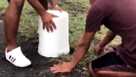 Funny people, guys get ready to lift the bucket to grab what they captured