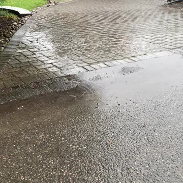 Before Berm - rain washes down driveway