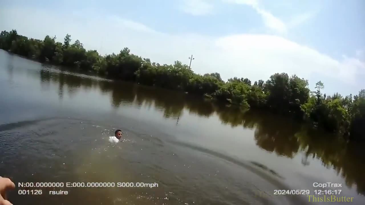 Body Cam Video Shows Fugitive Jumping into Pond to Escape Police