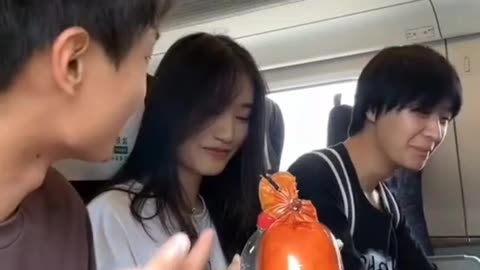 sharing food with strangers on the train