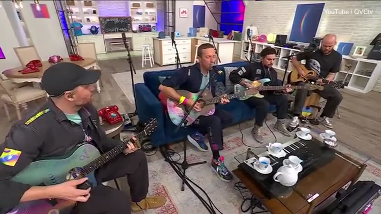 Coldplay makes surprise appearance on the QVC shopping channel