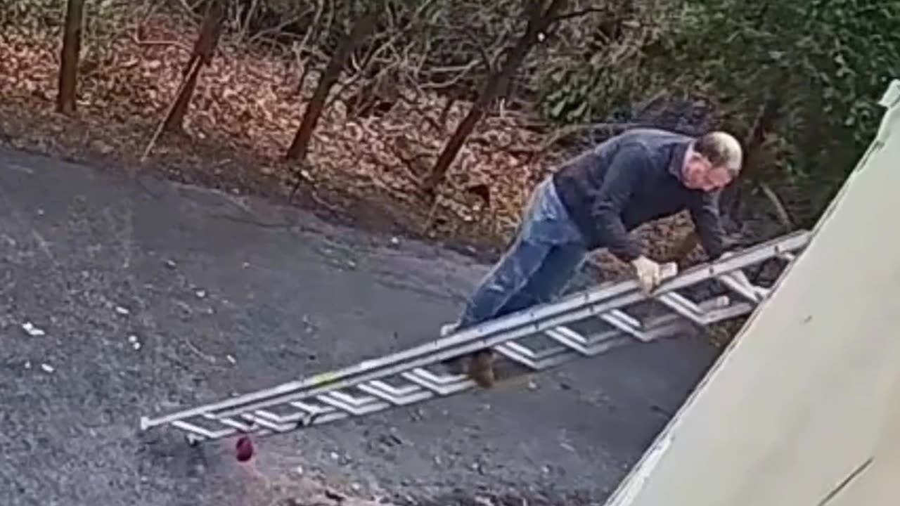 Ladder Falls Down With Man on It