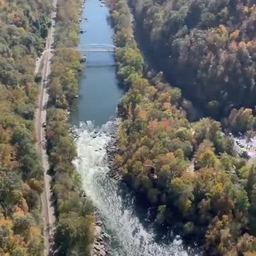 "Brave or Insane? Man Jumps from 1000ft into River"