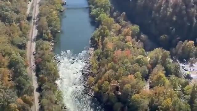 "Brave or Insane? Man Jumps from 1000ft into River"