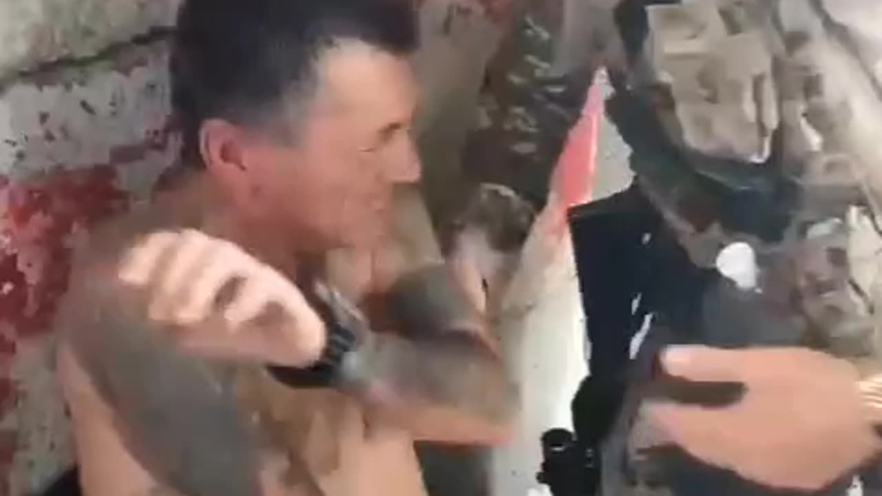 Russians captures a Ukrainian soldier covered in Nazi tattoos