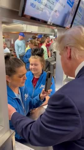 President Trump stops at a burger joint in South Carolina. The employees pray with him.