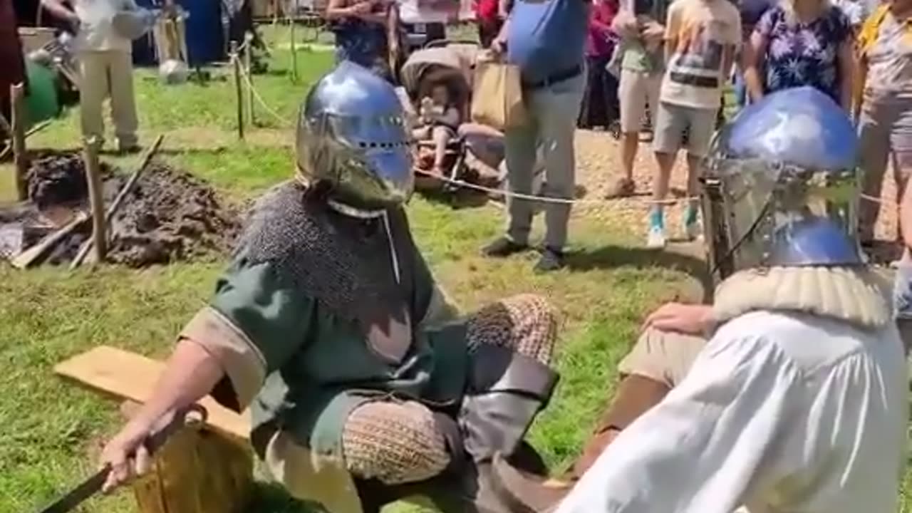 Funny people, medieval knights prepare for battle