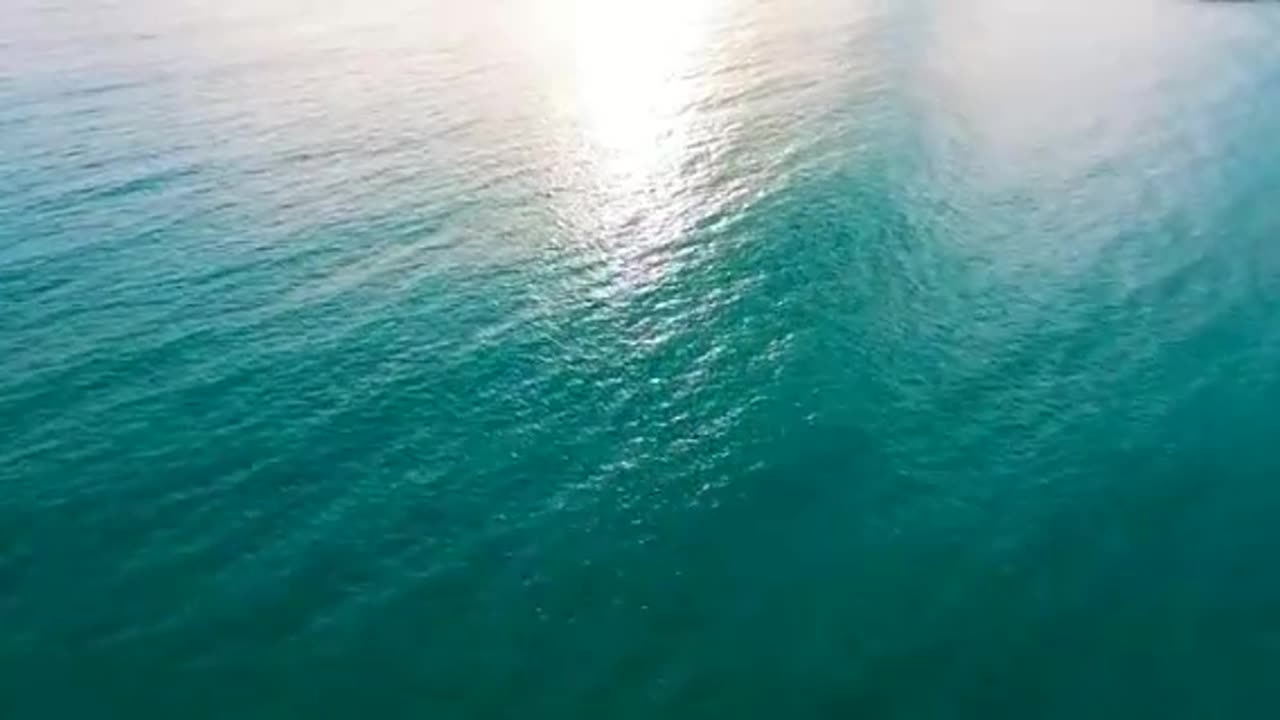 Drone Flying Above The Sea Surface