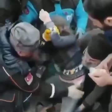 Turkish emergency crews save a little girl from a collapsed building