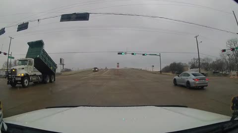 Dump Truck Knocks Down Stoplight