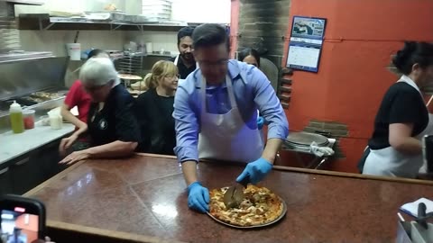 Pierre Poilievre Slices A Pizza, 2023-02-11