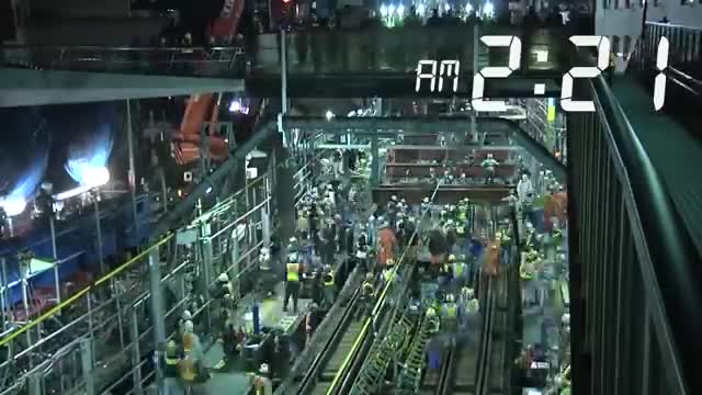 1,200 Japanese workers convert above-ground train to subway line in just 3 hours