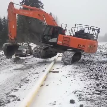 How do you go over a pipe with the excavator without breaking it
