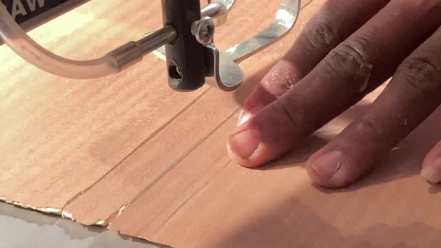 How we cut veneer using the scroll saw.