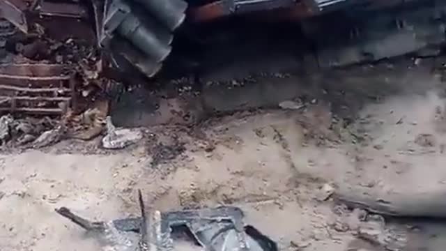 Examining a Destroyed Russian T-72