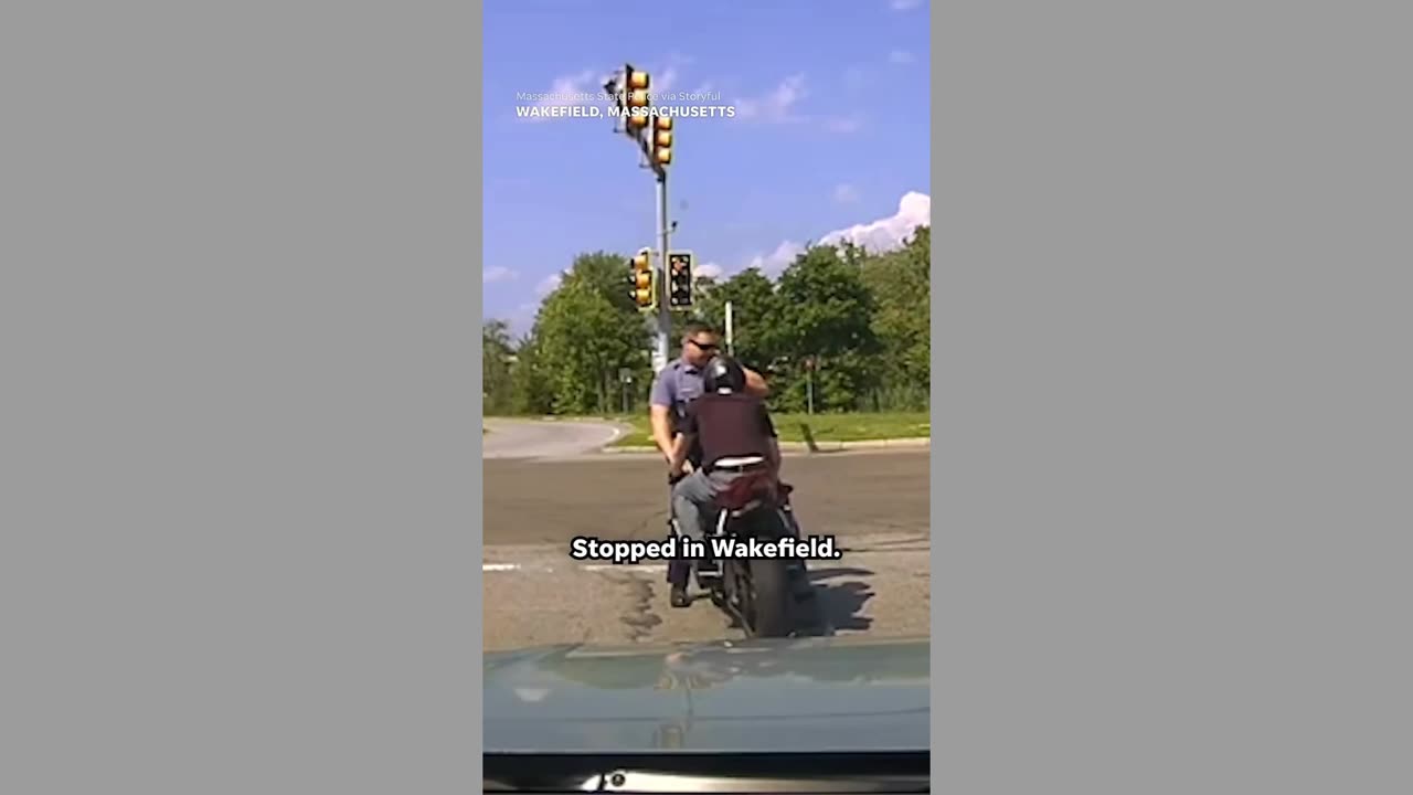 MOTORCYCLIST DRIVES TROOPER INTO TRAFFIC!!!