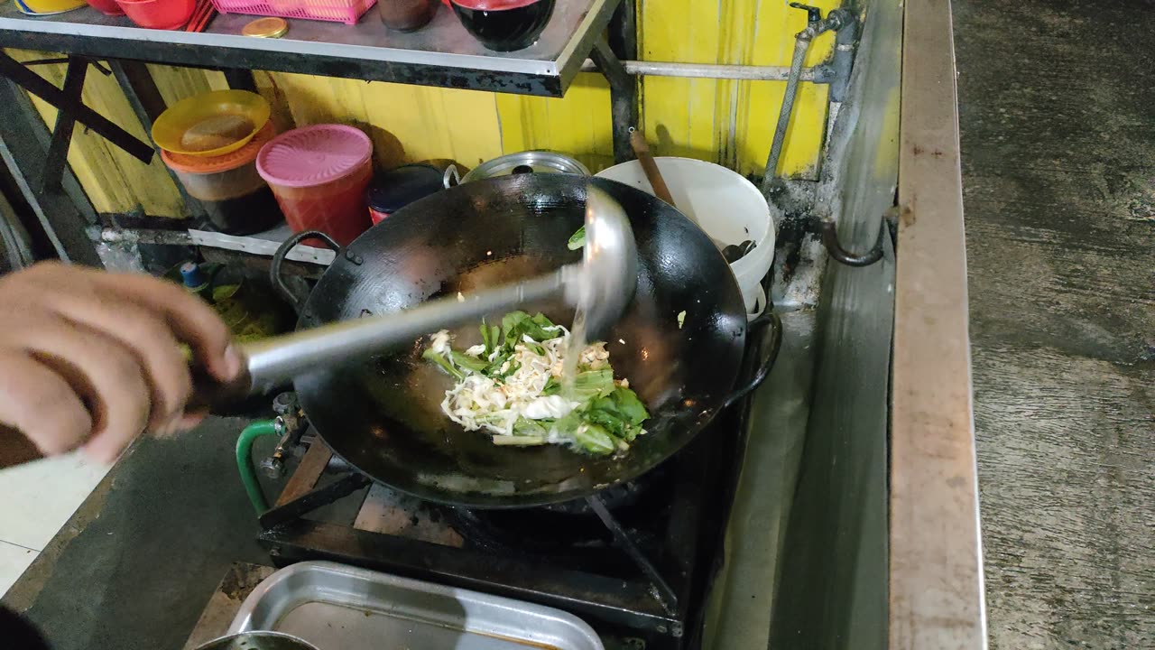 cooking fried noodles