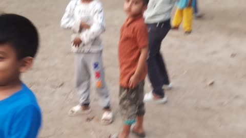 Village Boys Playing Football For Fun