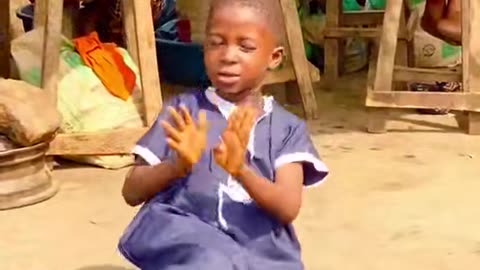 Funny Kid dancing in the market square