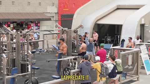 Old man power lifting on usa road