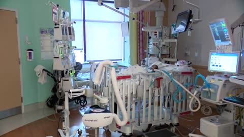 Triple virus threat easing in US, but hospitals remain full