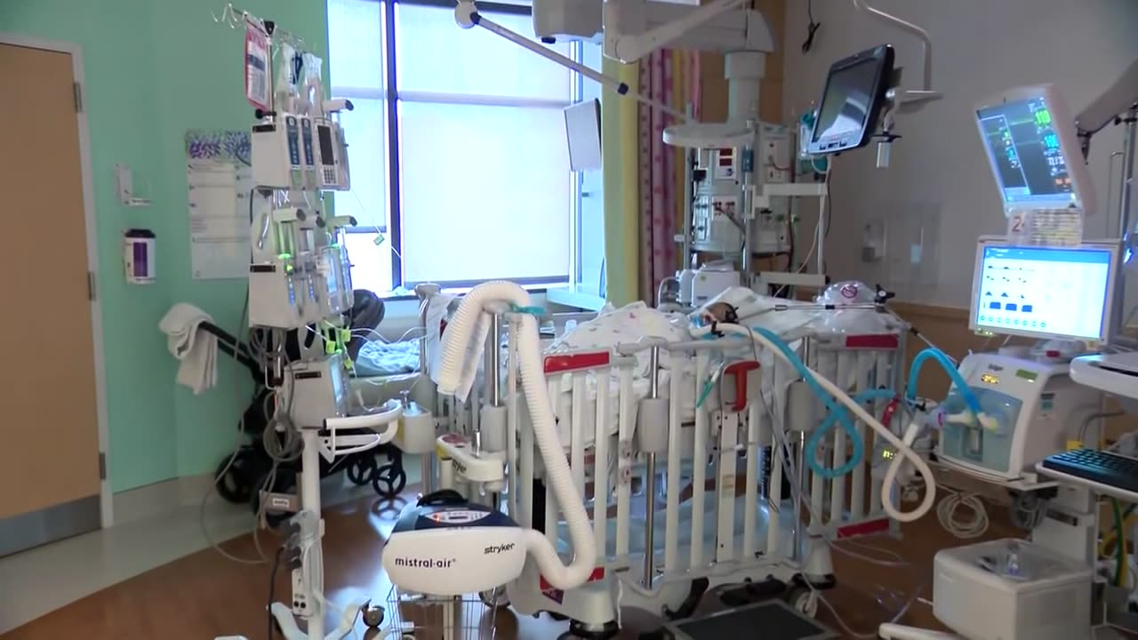 Triple virus threat easing in US, but hospitals remain full