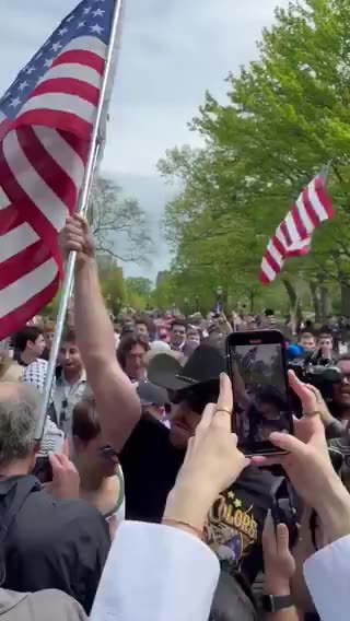 Counter protesters waving American flag are blasting “Born in the USA”🔥🔥🔥