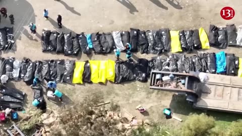 Drone footage shows hundreds of quake victims buried in mass graves