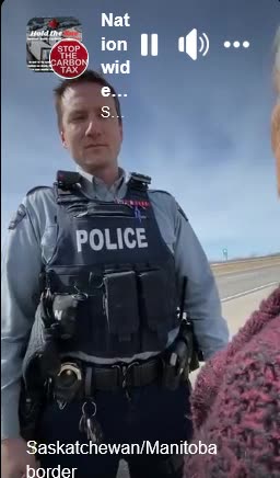 Canadian senior speaks with R.C.M.P. Officer.