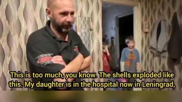 The child of this man was shot by a Ukrainian sharpshooter