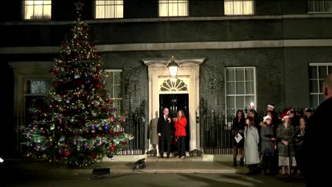 Keir Starmer lights Downing Street Xmas tree for first time as PM