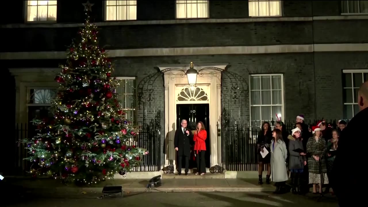 Keir Starmer lights Downing Street Xmas tree for first time as PM