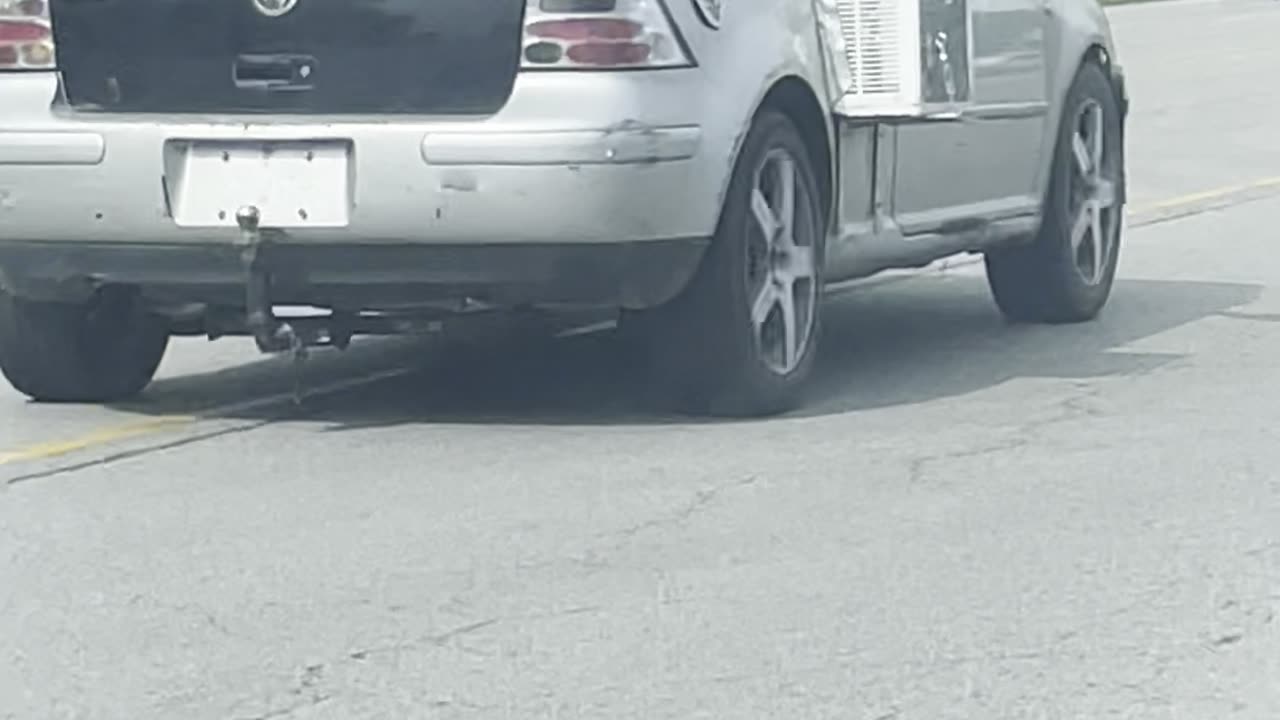 Car With AC Unit in Door