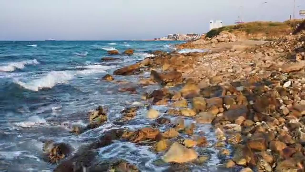 Strong Sea Waves Crashing The Rocky Shoreline