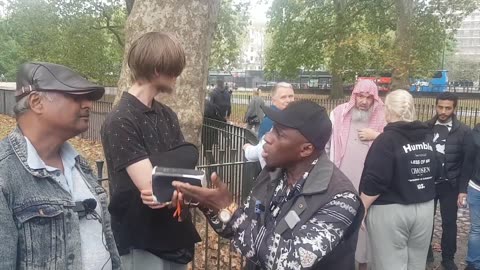 Speakers Corner - Uncle Sam & Christian Talk to Lamin Who Proves the Trinity But