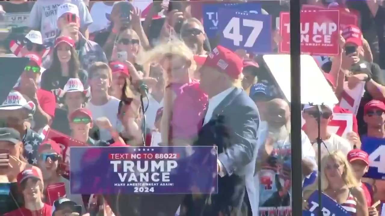 Trump's Granddaughter Joins Him On Stage During NC Rally