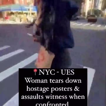 Woman tears down posters of Israel hostages in NYC