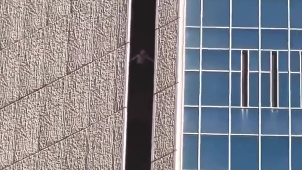 A man climbing a Chase Tower in downtown Phoenix, Arizona